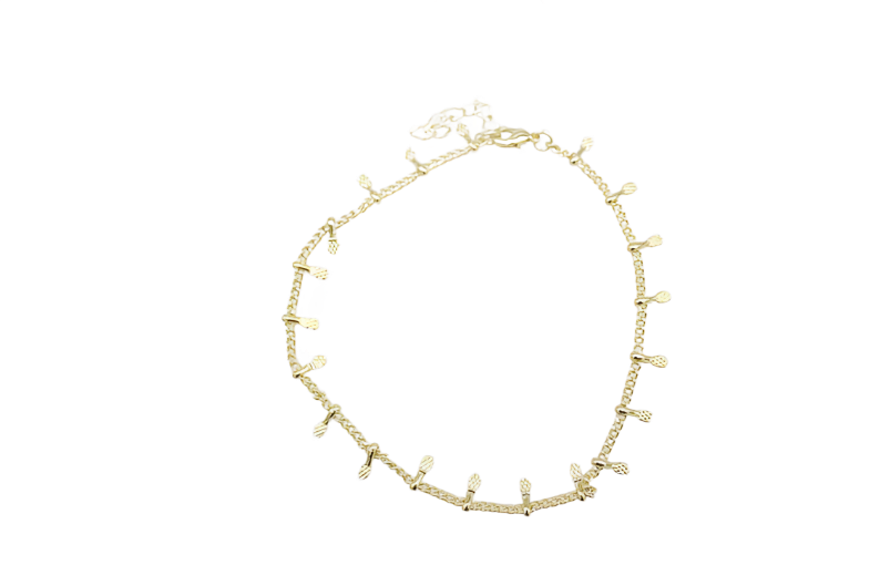 A delicate gold anklet features small dangling pineapple charms displayed on a clean white background.