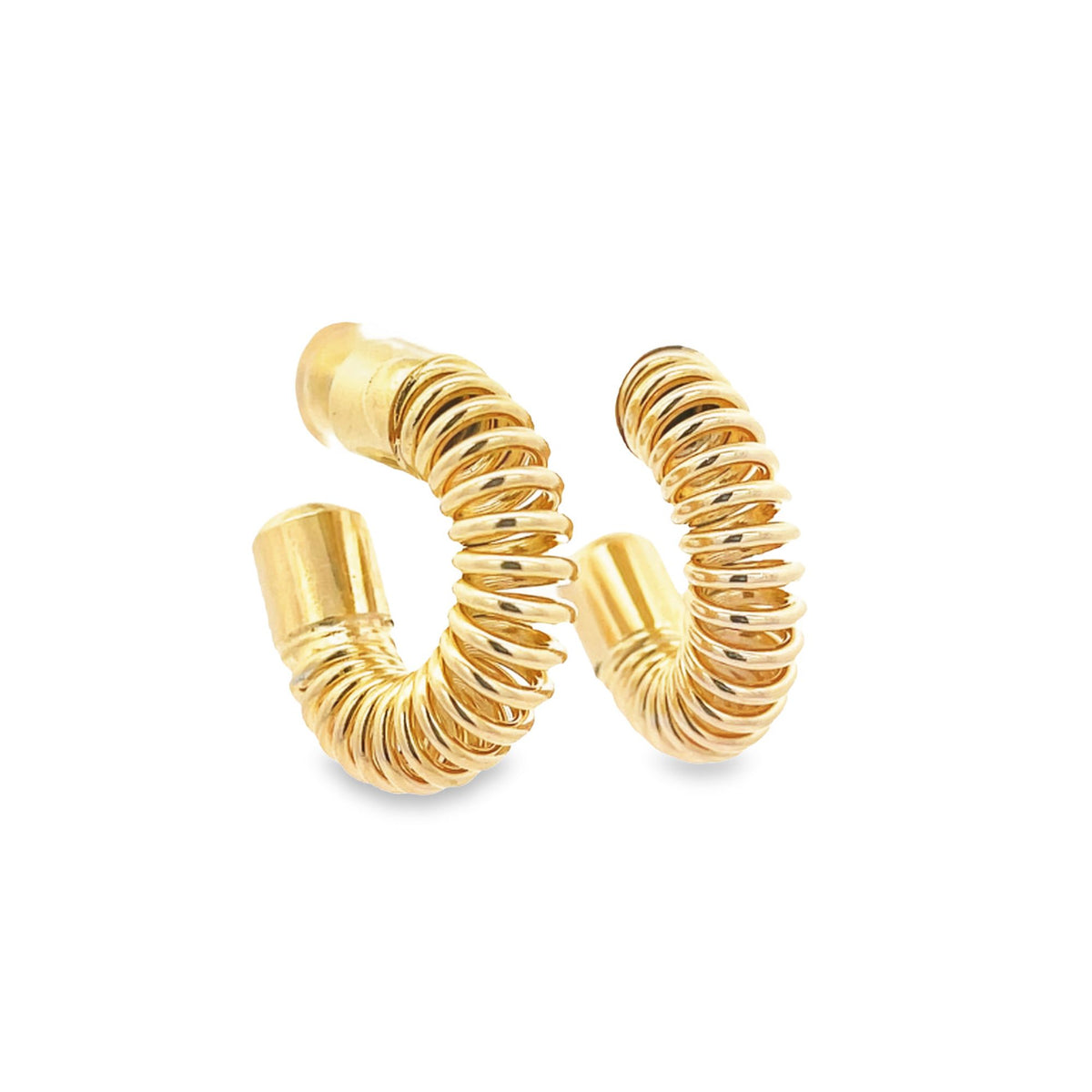 A pair of shiny gold hoop earrings features a unique coiled spring design against a clean white background.