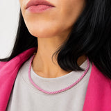 Modern twisted color cord choker necklace featuring 18K Gold Filled hardware and adjustable chain. Lightweight, stylish, and available in multiple colors.