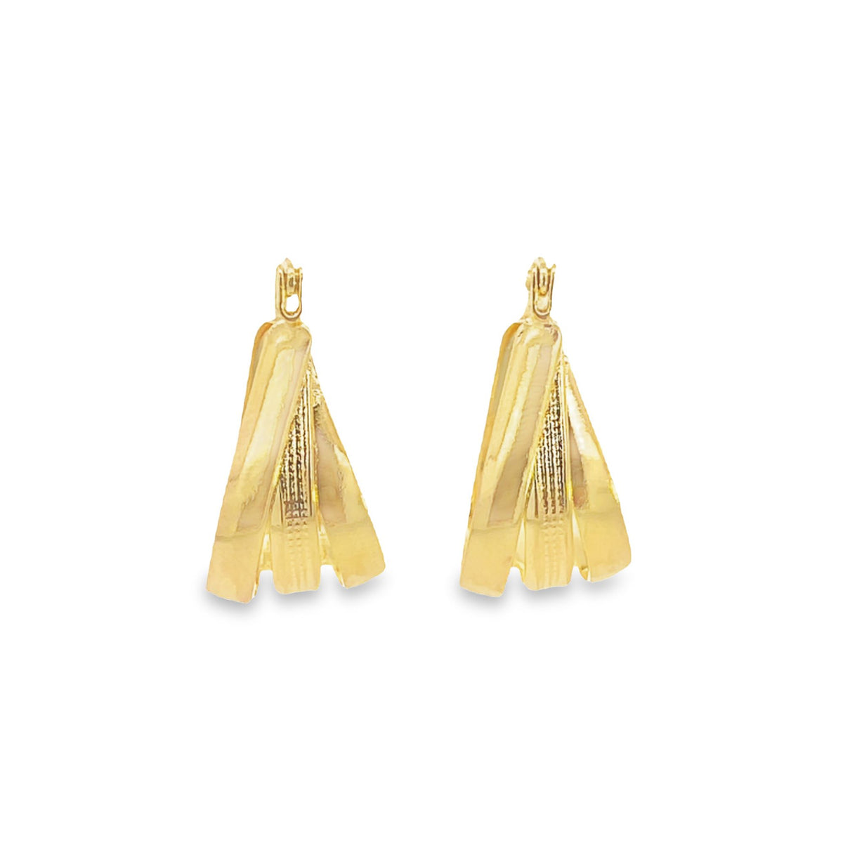 A pair of gold hoop earrings featuring a multi-layered design rests on a white background.