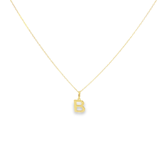 A delicate gold chain necklace displays a shiny initial B pendant.