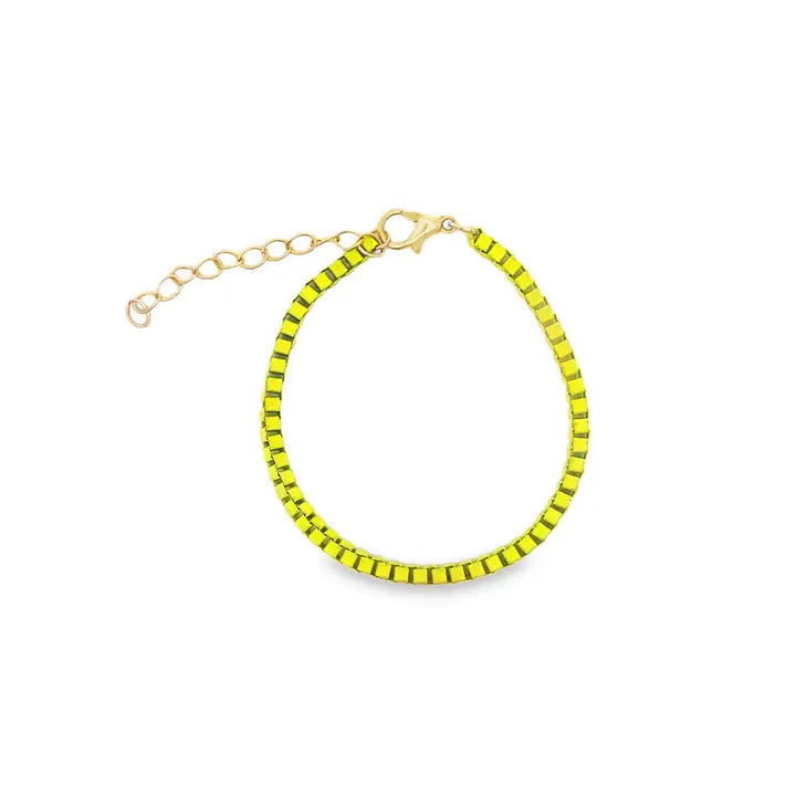 A vibrant neon yellow beaded bracelet features a gold clasp and adjustable chain on a clean white background.