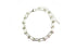 A shiny silver paperclip chain bracelet featuring interlocking links accented with small metallic beads lies curved against a clean white background.