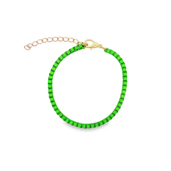A bright neon green beaded bracelet features a gold-tone lobster clasp and an adjustable extension chain against a white background.