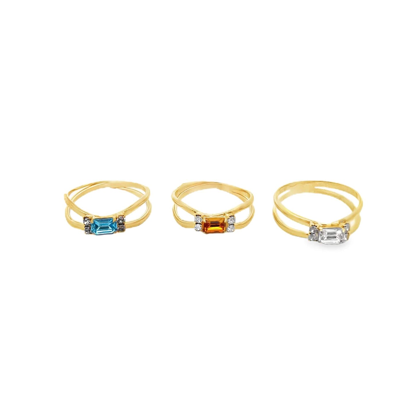 Three gold double-band rings display emerald-cut gemstones in blue, orange, and clear, flanked by tiny accent diamonds.