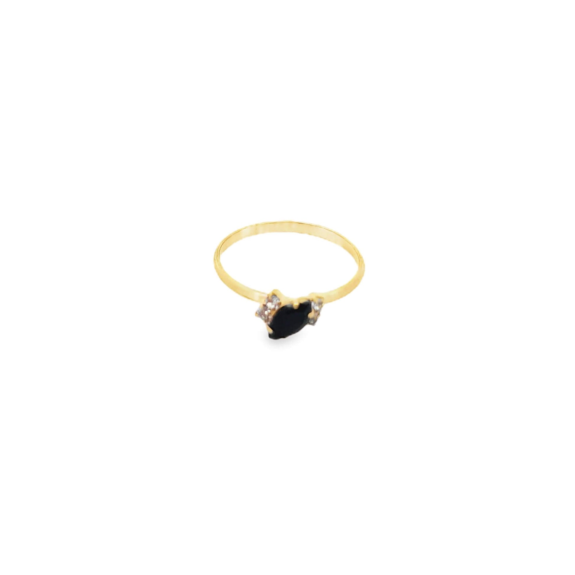 A delicate gold ring features a striking black marquise gemstone accented by tiny sparkling diamonds.
