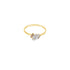 A delicate gold ring showcases a sparkling marquise-cut diamond accented with smaller brown gemstones.