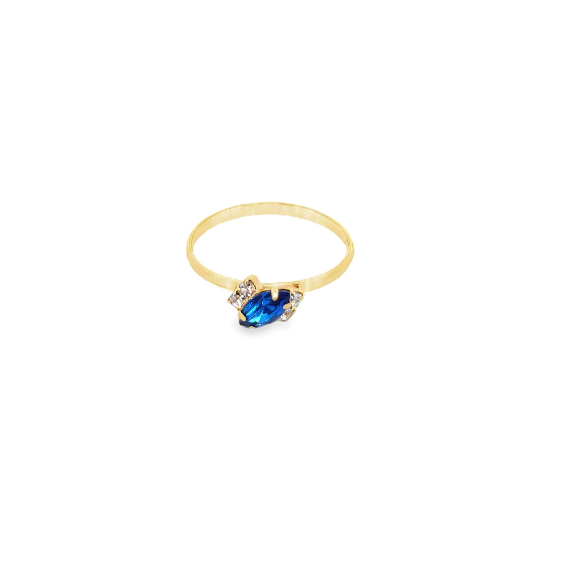 A delicate gold ring showcases a marquise-cut blue sapphire accented with small sparkling diamonds against a plain white background.