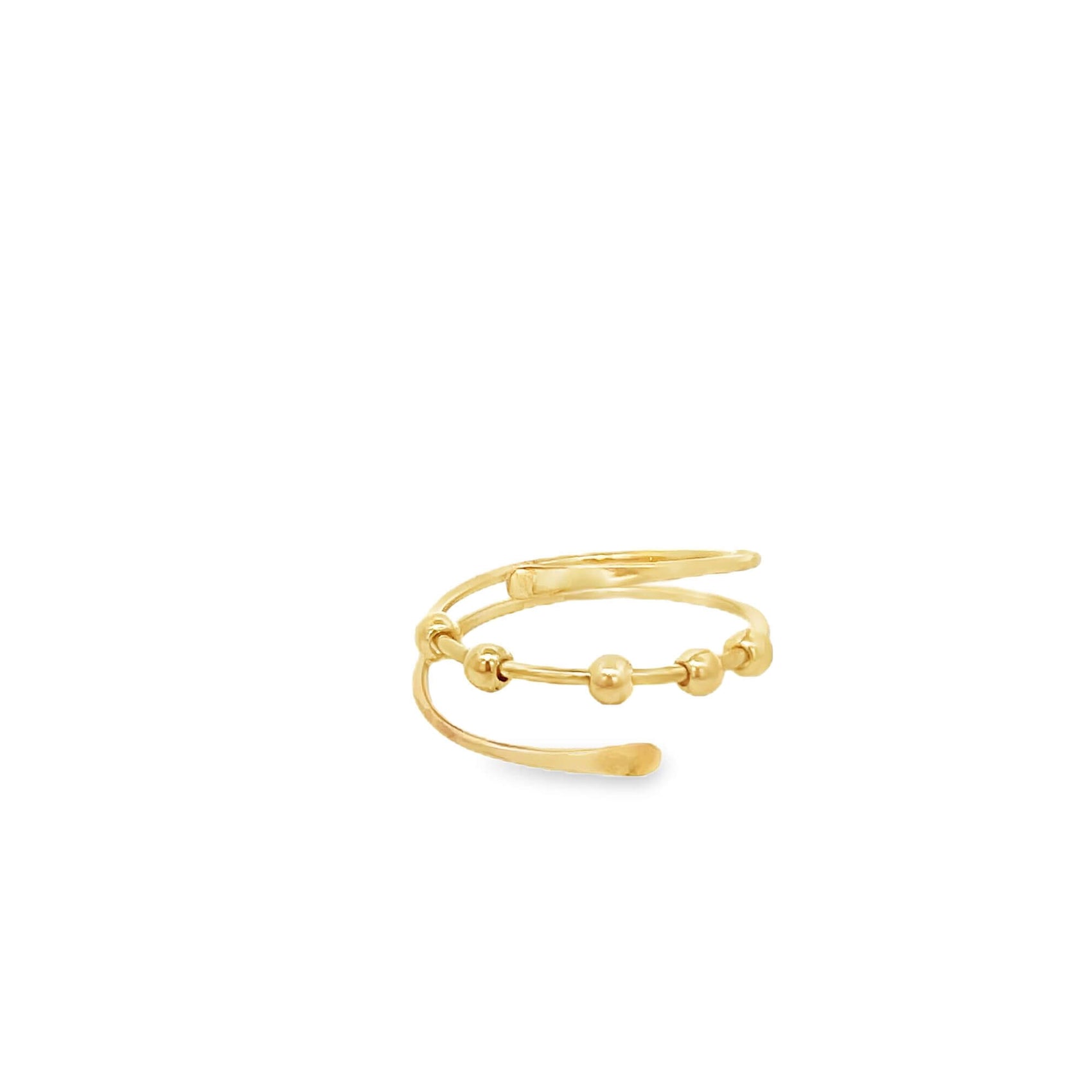 A gold fidget ring features multiple movable beads along an open spiral band.