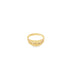A polished yellow gold croissant dome ring rests against a clean white background.