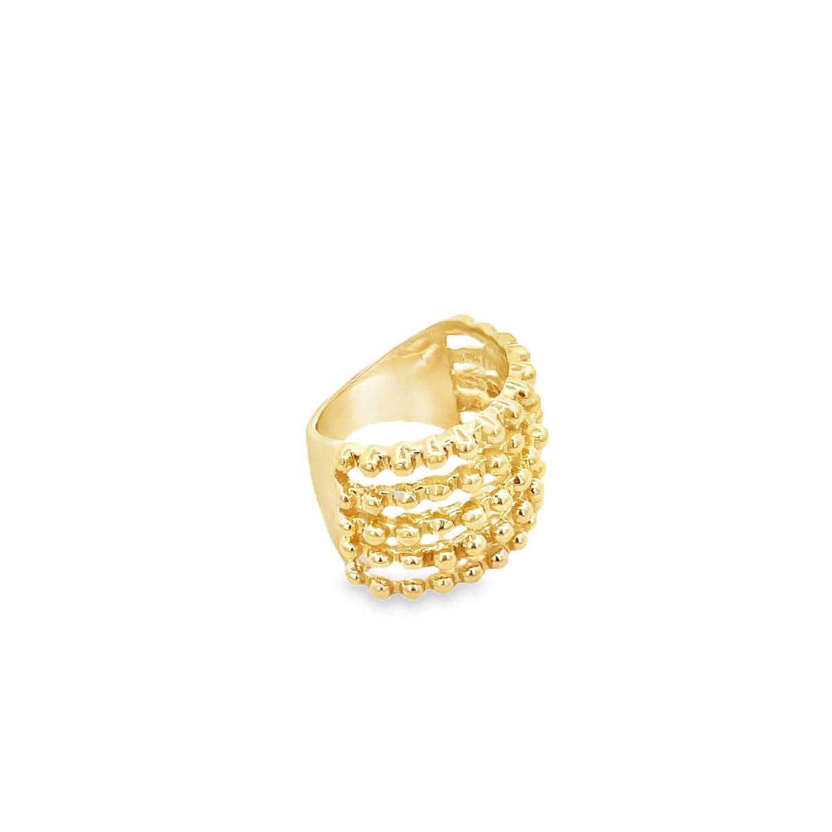 A wide gold statement ring features multiple rows of delicate beaded texture.