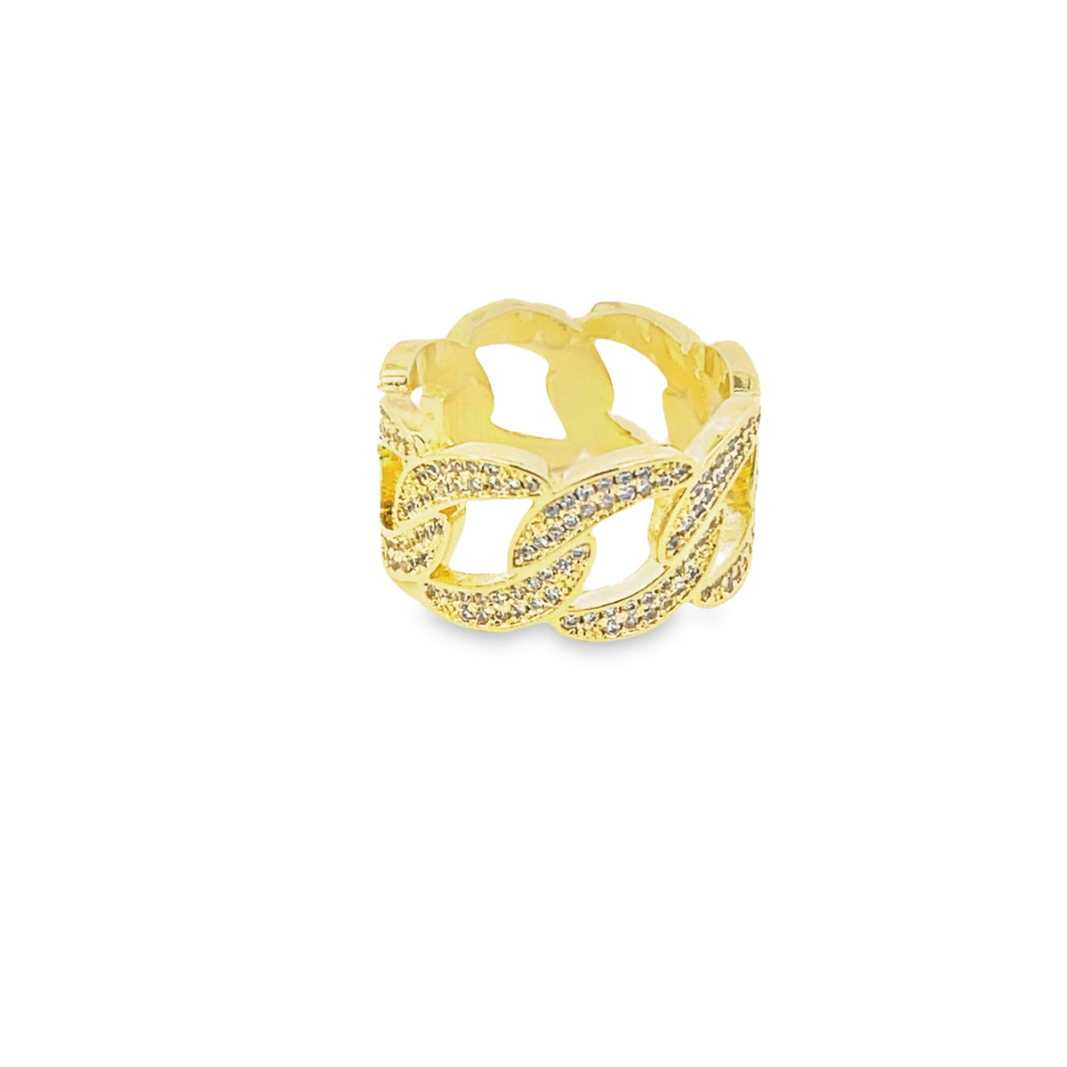 A gold cuban link ring encrusted with shimmering cubic zirconia stones rests against a clean white background.