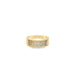 A wide gold band ring sparkles with pave-set cubic zirconia stones in a multi-row mosaic pattern against a white background.