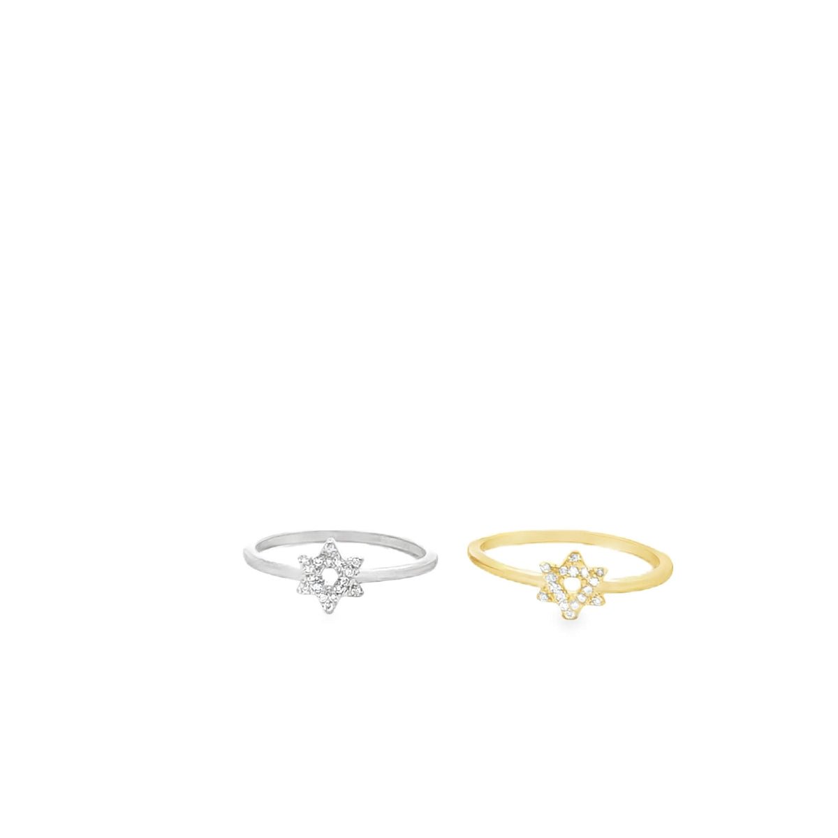 Two delicate diamond Star of David rings, one in silver and one in gold, rest side by side on a clean white background.