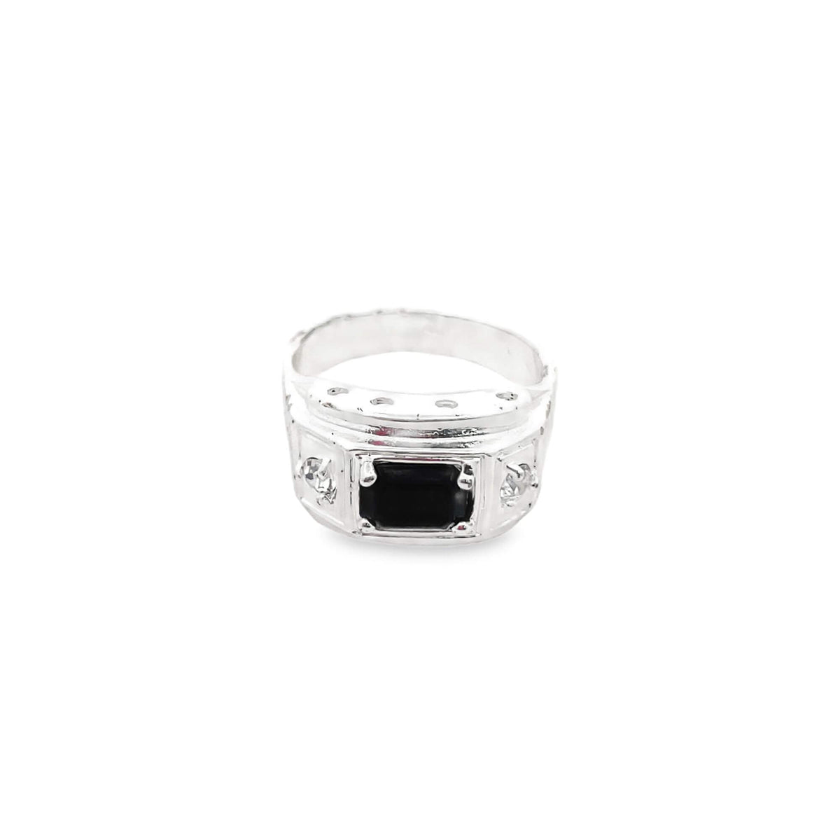 A silver men's ring features a prominent rectangular black gemstone flanked by smaller accent stones on an engraved band.