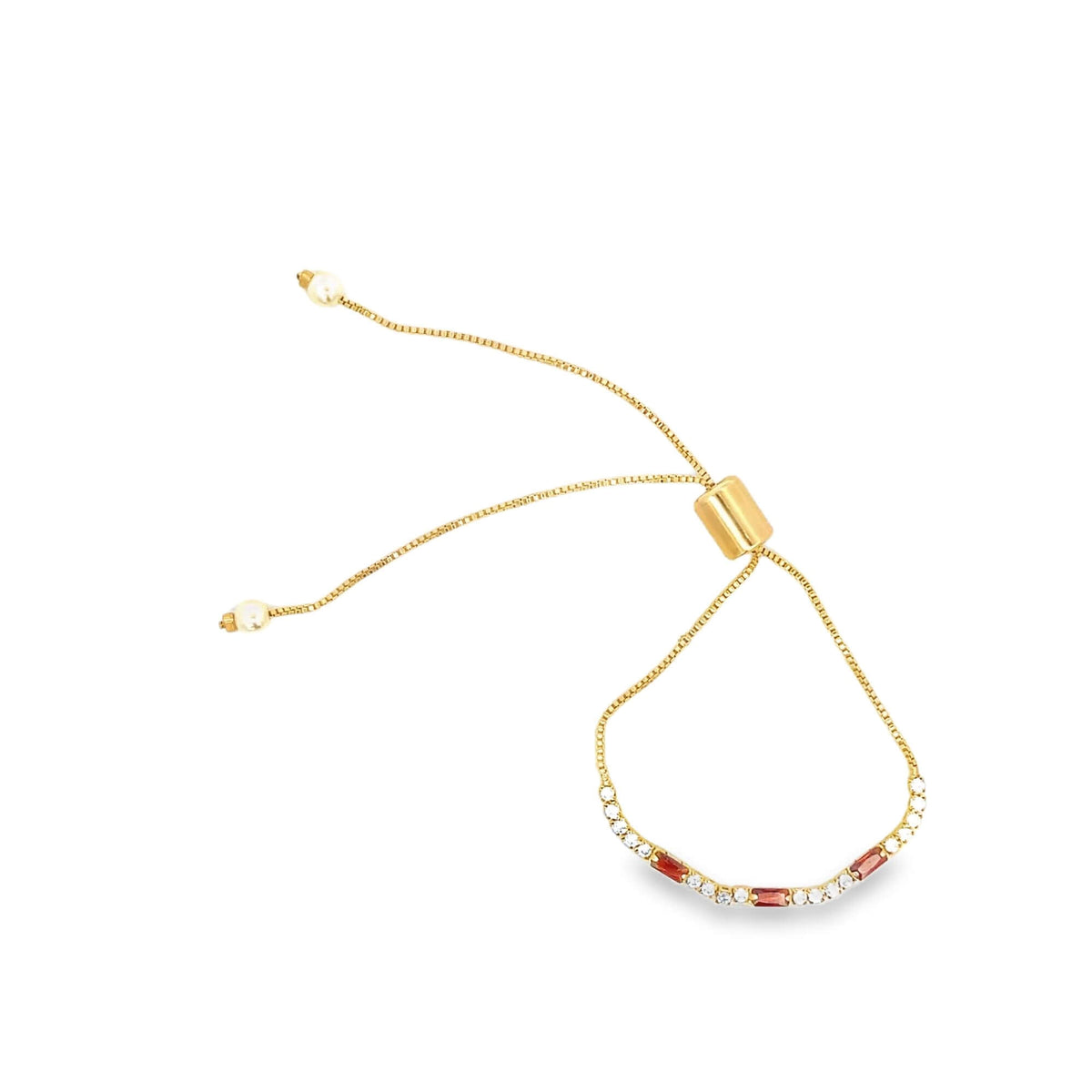 A delicate gold slider bracelet features sparkling cubic zirconia and vibrant red gemstones, finished with dainty pearl ends.
