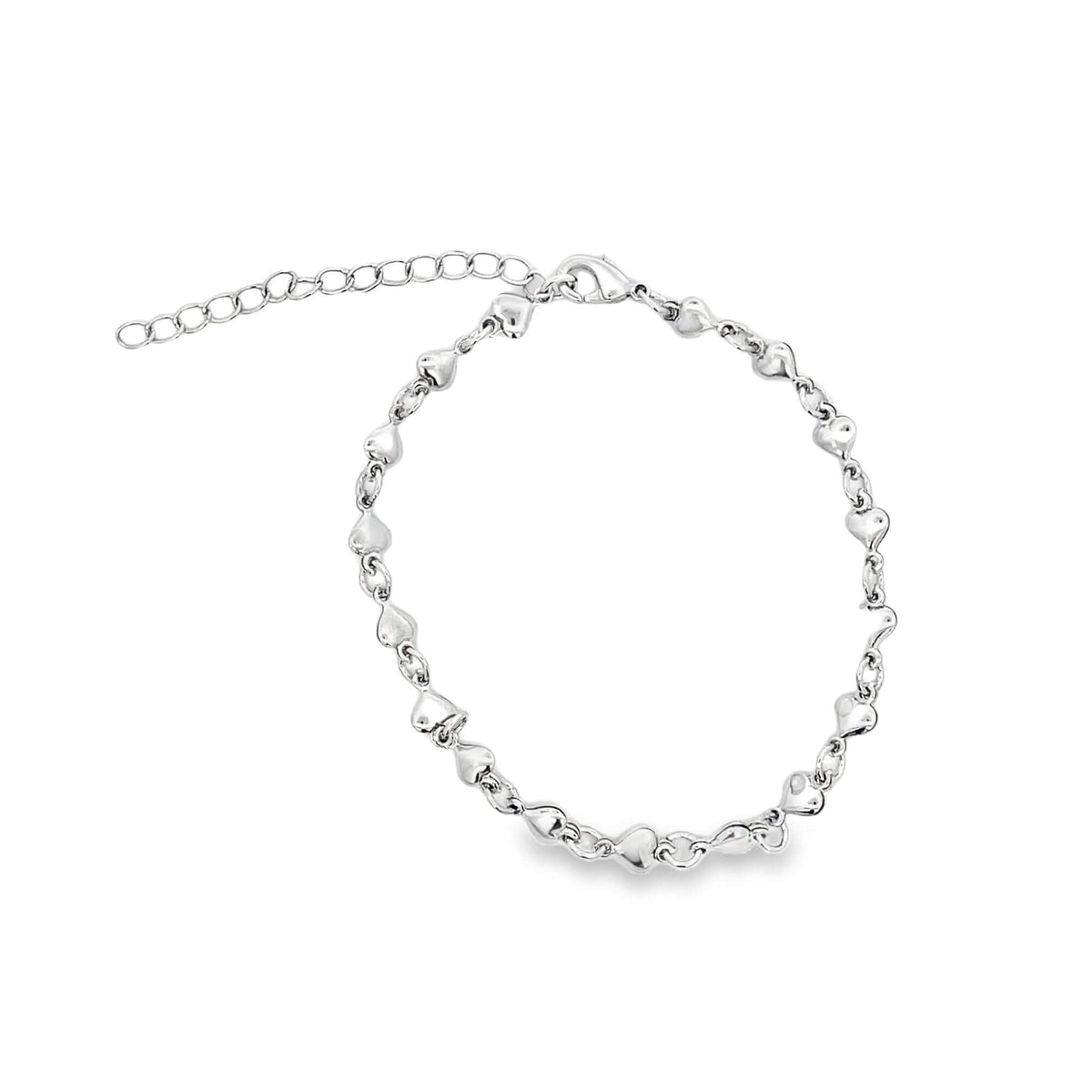A shiny silver heart chain bracelet rests in a circle on a white background, featuring an adjustable extender chain with a lobster clasp.