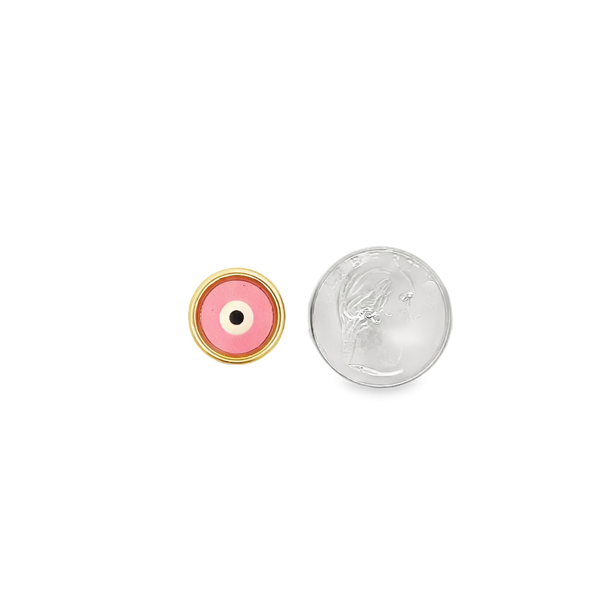 A small round pink evil eye stud earring rests next to a US dime for size comparison.