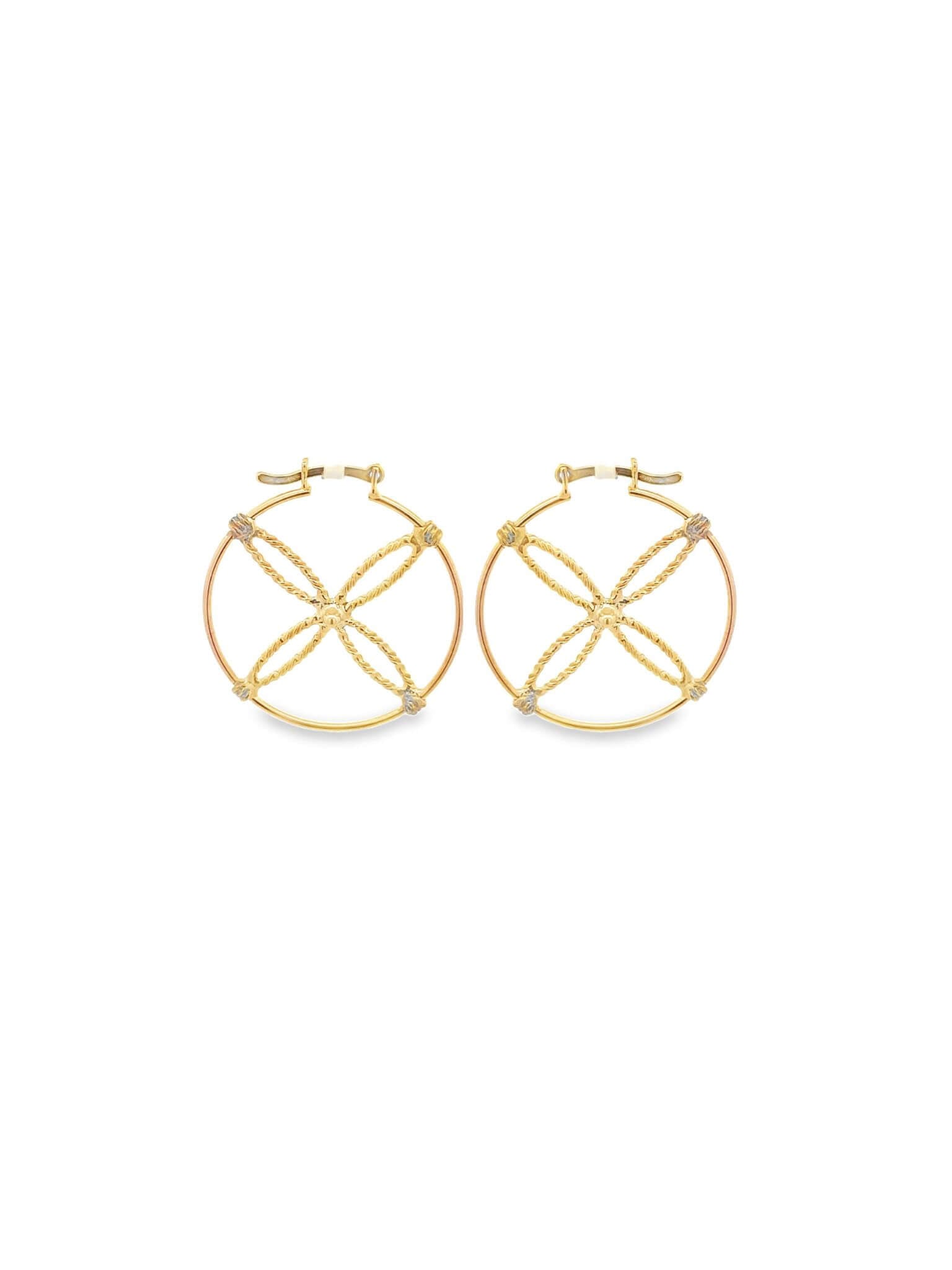 A pair of gold hoop earrings features an intricate crisscross geometric design inside each circle.