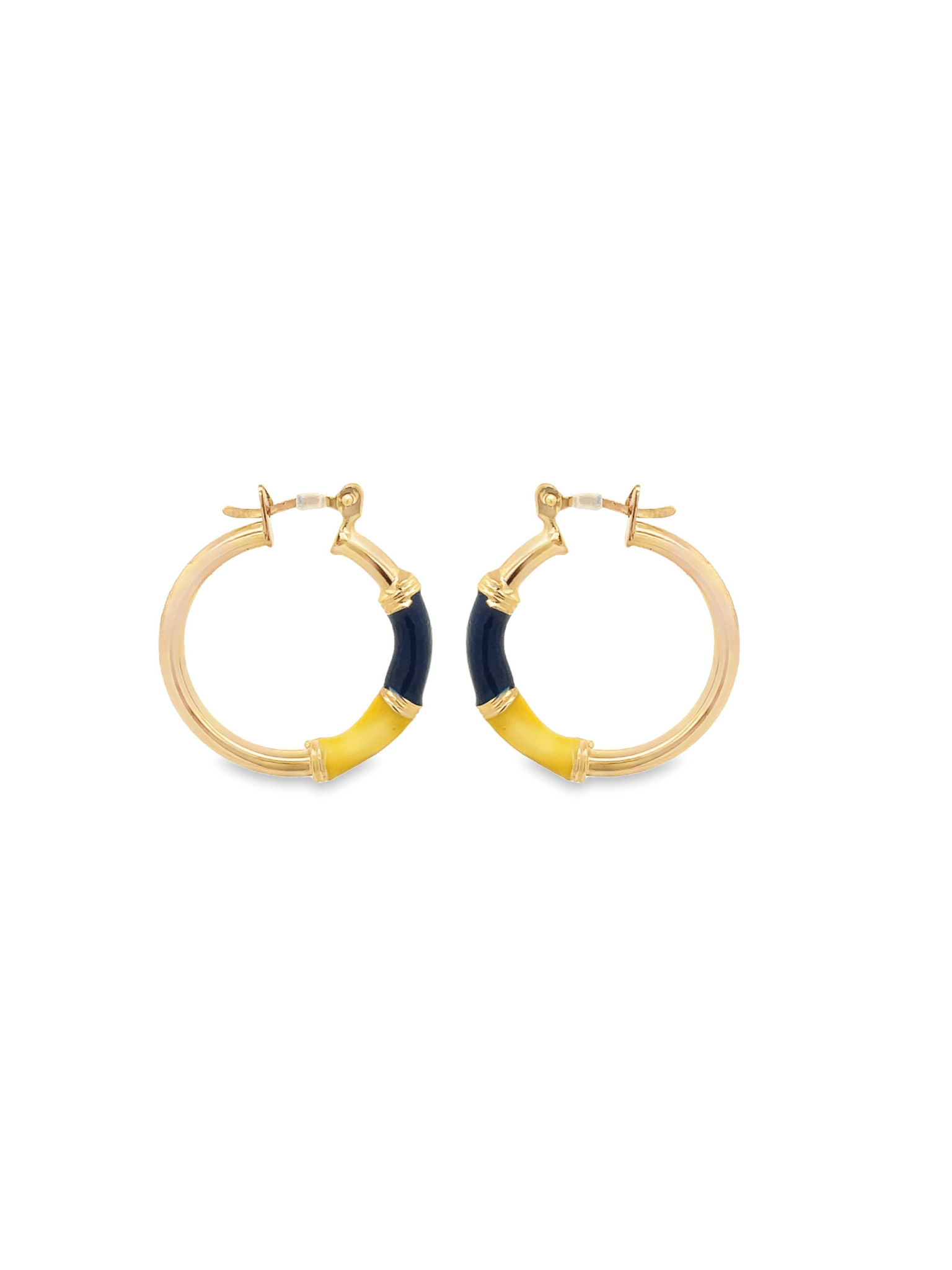 A pair of gold hoop earrings featuring navy blue and yellow enamel accents rest against a clean white background.