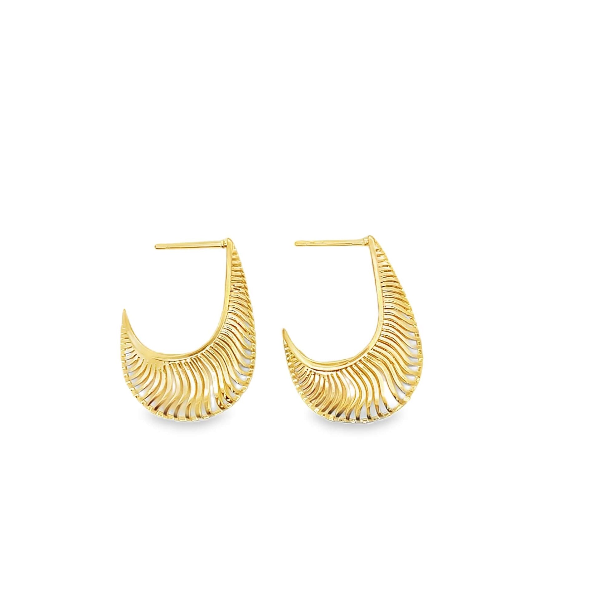 A pair of gold crescent-shaped hoop earrings featuring a textured, openwork design rests against a clean white background.