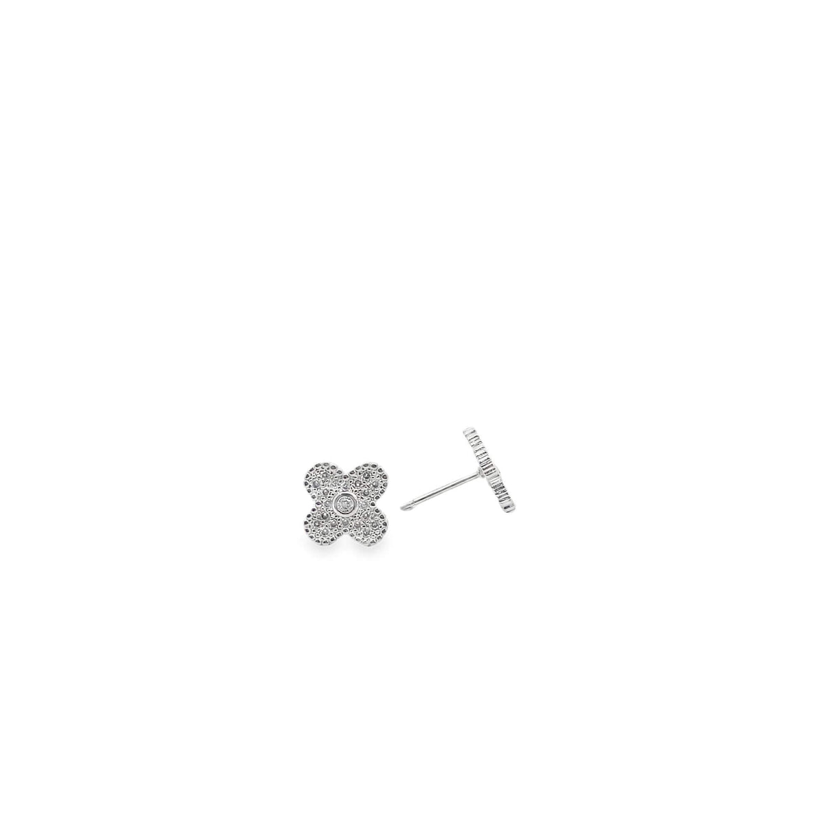 A sparkling diamond clover stud earring rests on a white background, showcasing its intricate floral design.