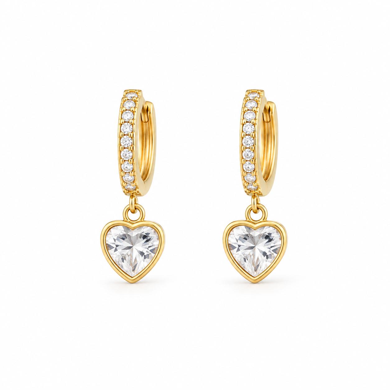Elegant 18K Gold Filled pave huggie earrings featuring sparkling heart-cut CZ drop charms. Lightweight, hypoallergenic, tarnish resistant, and perfect for everyday wear or gifting.