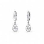 Shop pear-cut CZ drop huggie earrings featuring sparkling pavé hoops and teardrop cubic zirconia stones. 18K Gold Filled in Gold and Rhodium.