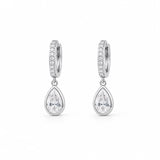 Shop pear-cut CZ drop huggie earrings featuring sparkling pavé hoops and teardrop cubic zirconia stones. 18K Gold Filled in Gold and Rhodium.