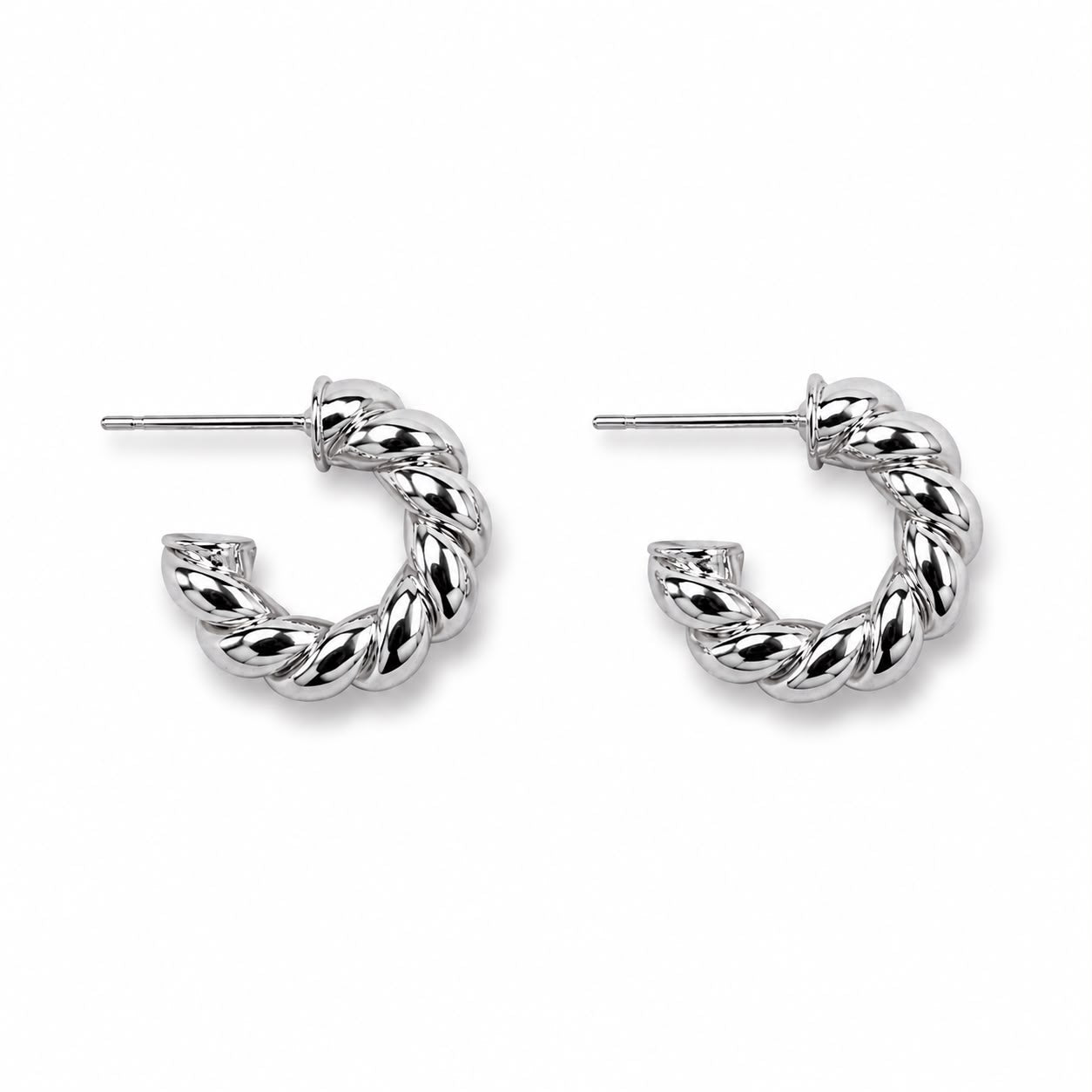 Classic twisted rope hoop earrings crafted in 18K Gold Filled and Rhodium. Lightweight, polished, hypoallergenic hoops for everyday wear.