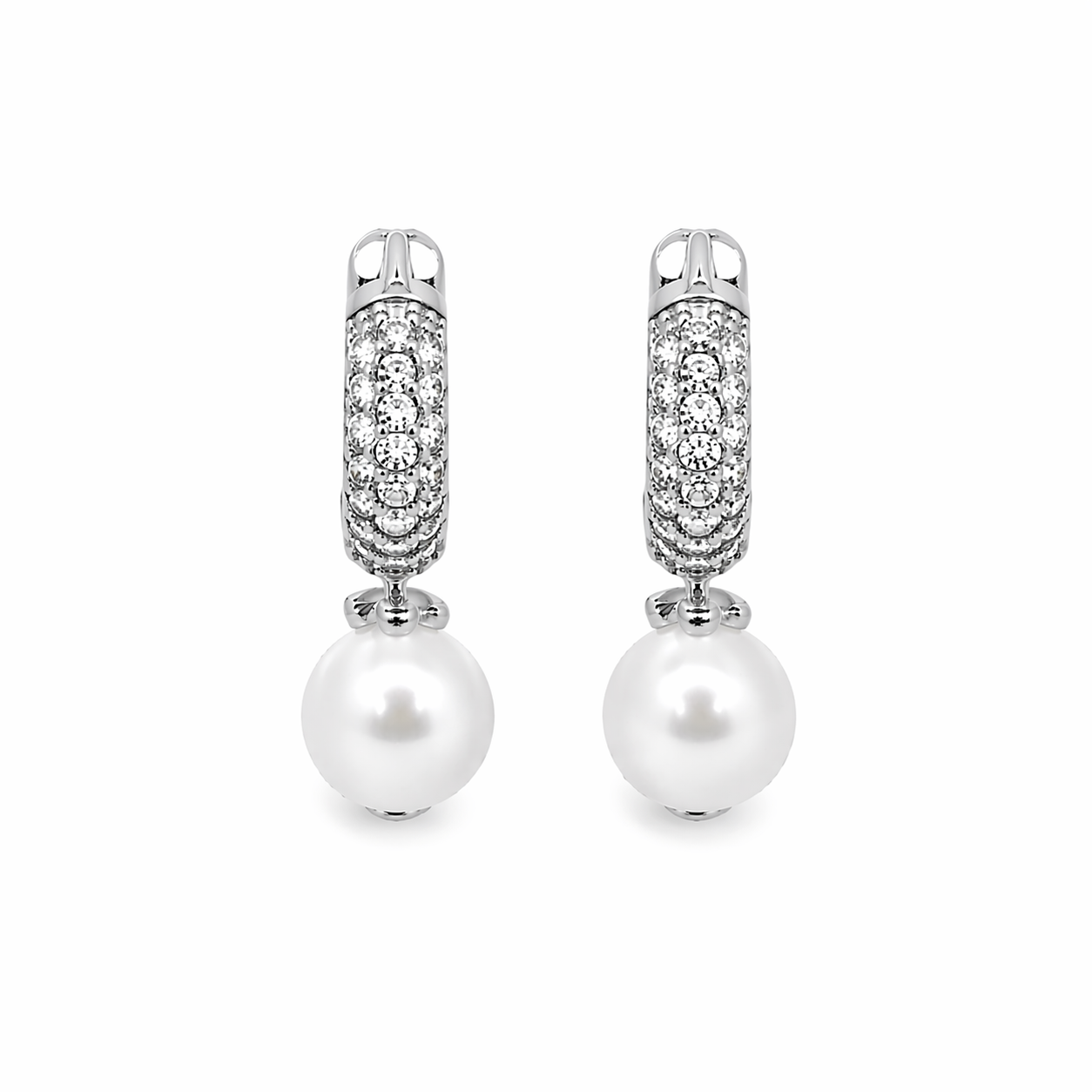 Elegant pearl drop huggie earrings with pavé CZ stones. Minimalist gold hoop earrings perfect for everyday wear or special occasions