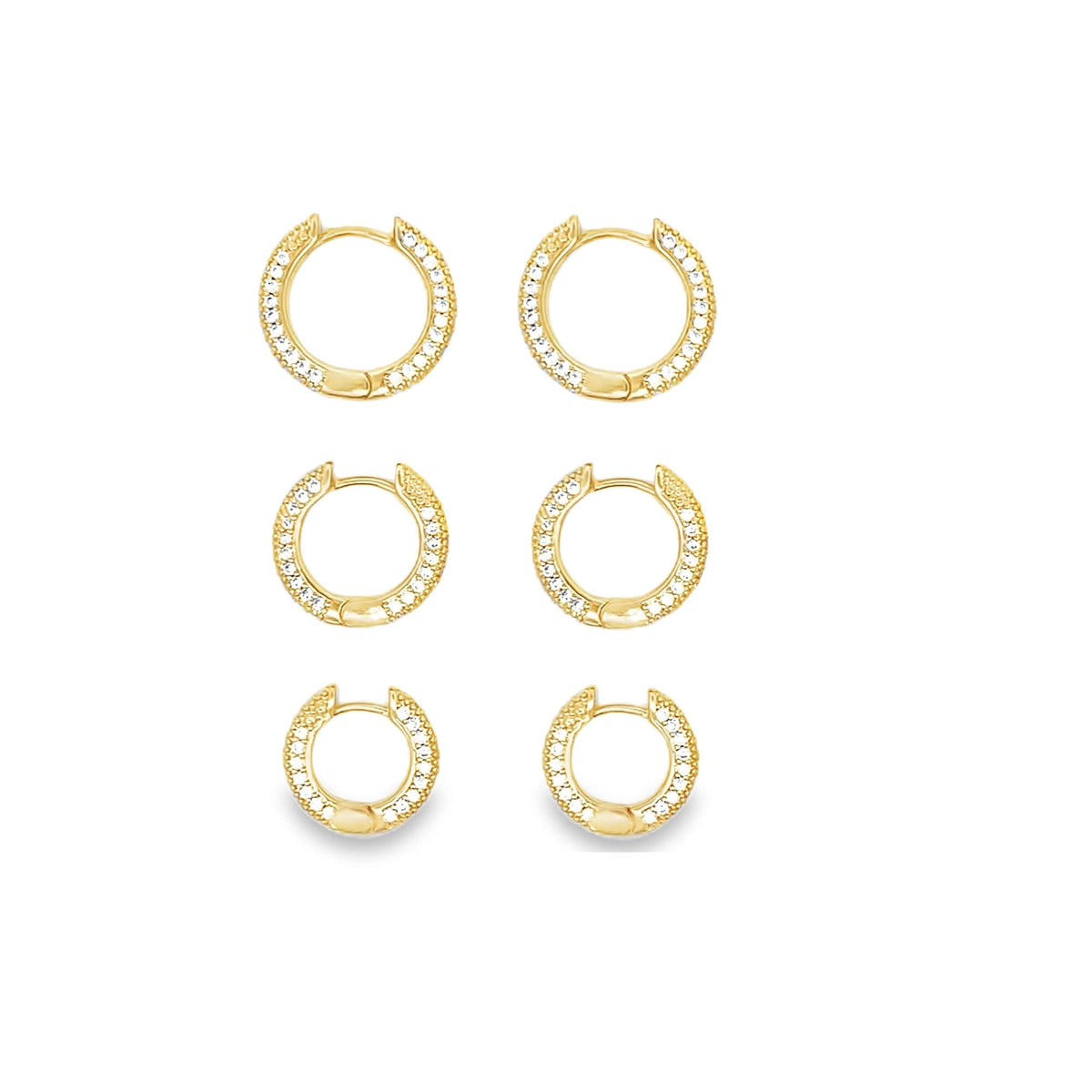 Three pairs of gold hoop earrings embellished with sparkling pavé crystals are neatly arranged in rows against a clean white background.