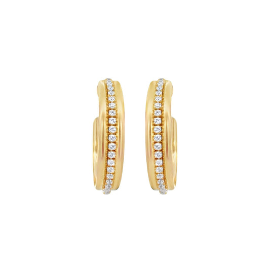 A pair of elegant gold huggie hoop earrings features a vertical channel of sparkling pavé-set diamonds down the center.