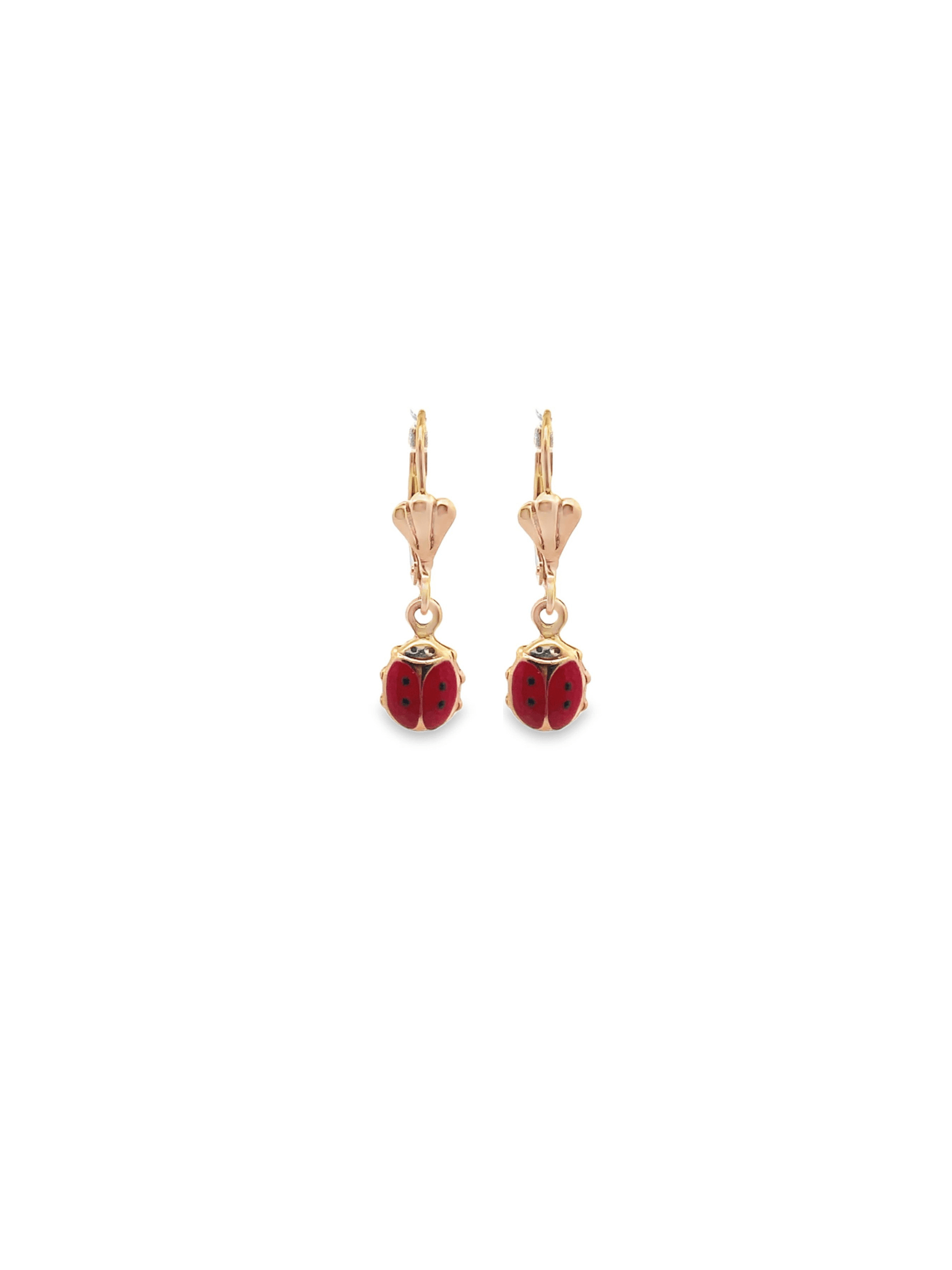 A pair of gold ladybug earrings feature vibrant red enamel with black spots dangling against a white background.