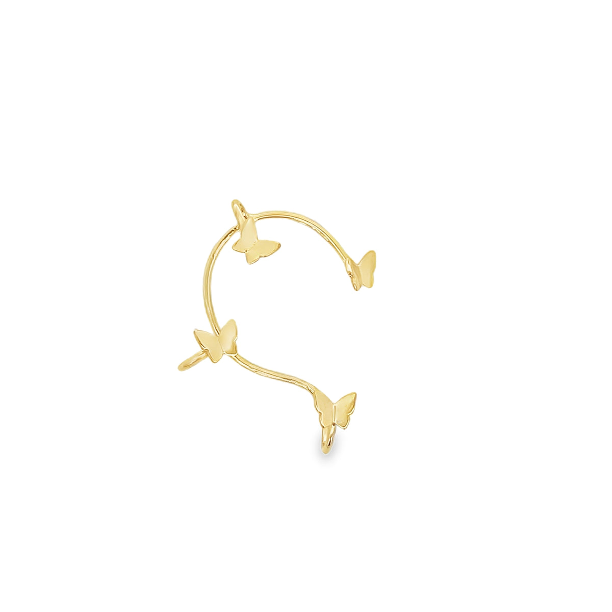 A delicate gold ear cuff features three dainty butterflies perched along its curved band.