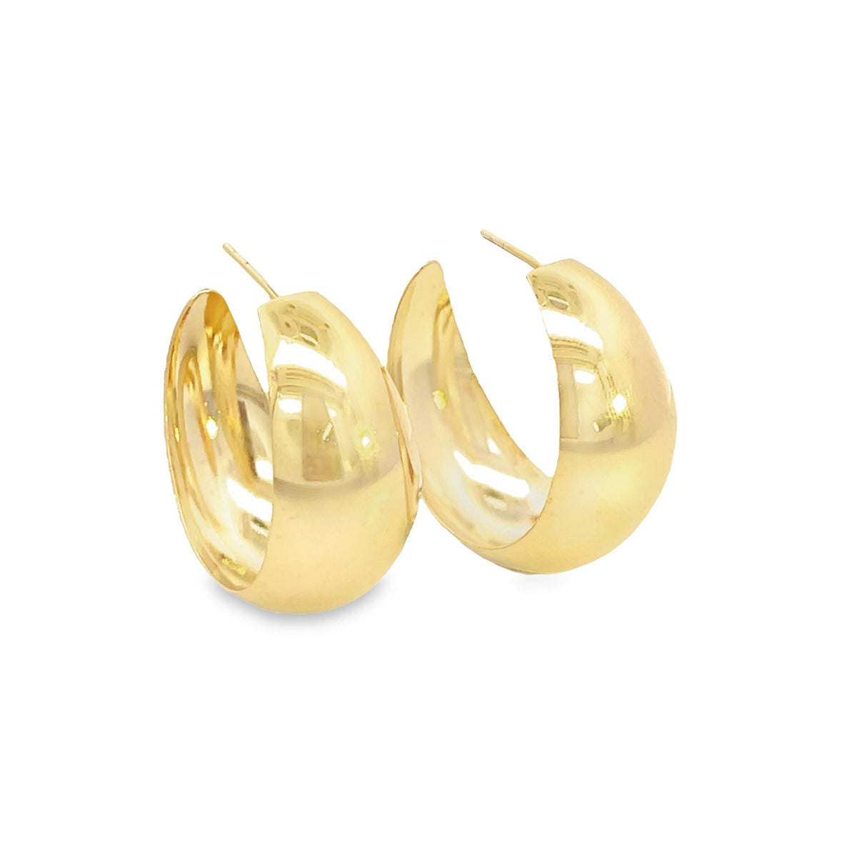 A pair of polished gold hoop earrings sits against a clean white background, showcasing their thick, reflective design.