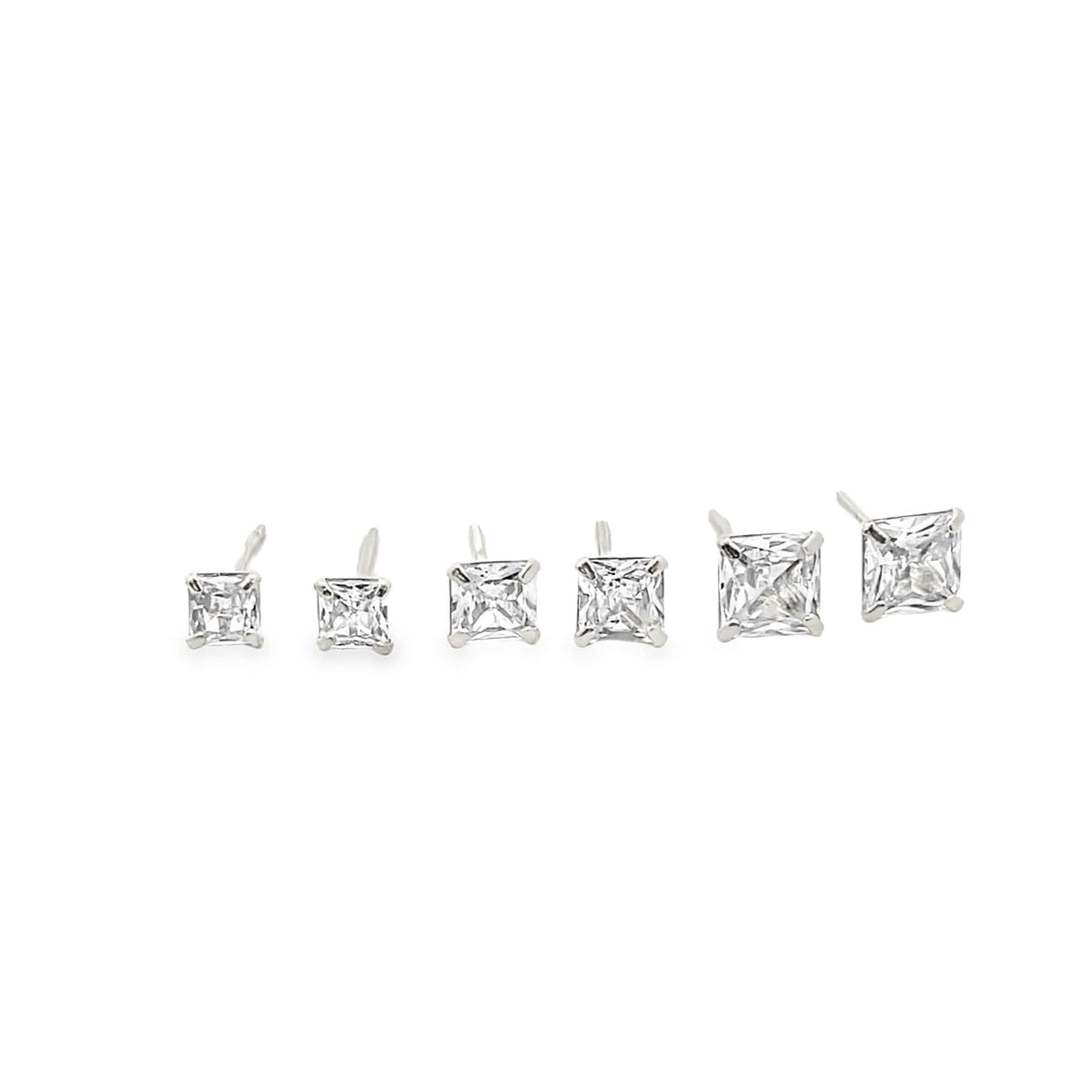 A row of six graduated square princess-cut cubic zirconia stud earrings in sterling silver displays increasing sizes from left to right against a clean white background.
