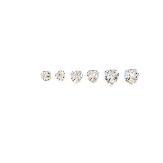 A row of six graduated heart-shaped diamond stud earrings sparkle against a clean white background.