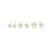 A row of six gold stud earrings features sparkling star-shaped cubic zirconia stones in graduating sizes against a clean white background.