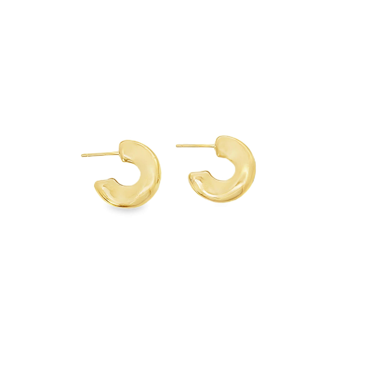 A pair of polished gold hoop earrings with a chunky, organic shape lies flat against a clean white background.