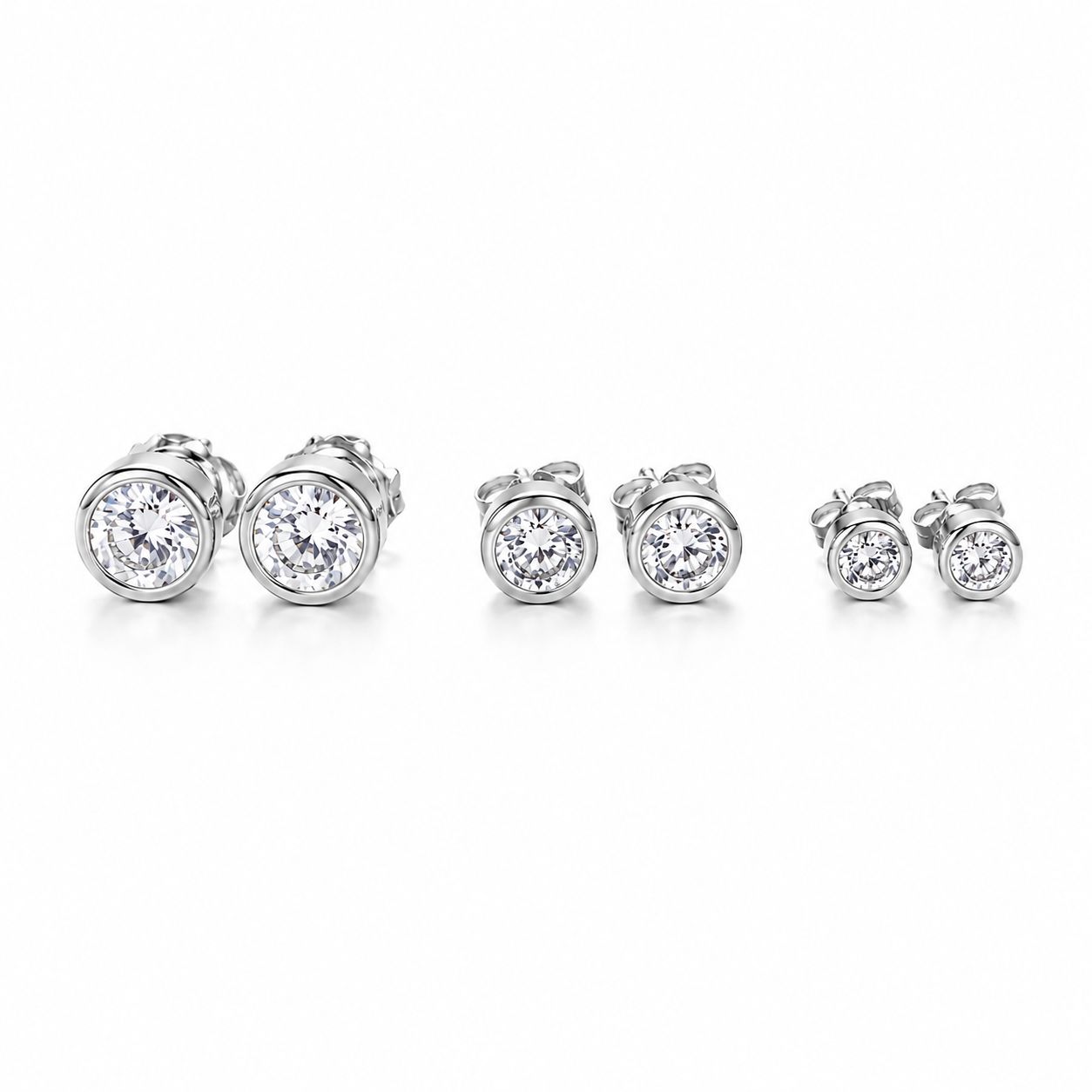 Classic round bezel CZ stud earrings crafted in 18K Gold Filled. Available in multiple sizes. Hypoallergenic, tarnish resistant, and perfect for everyday wear.