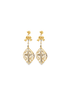 A pair of ornate gold dangling earrings features a bow top, a diamond-encrusted chain, and an intricate filigree drop pendant with a central cross.