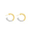 A pair of two-tone hoop earrings features a split design of polished gold and silver metal against a clean white background.