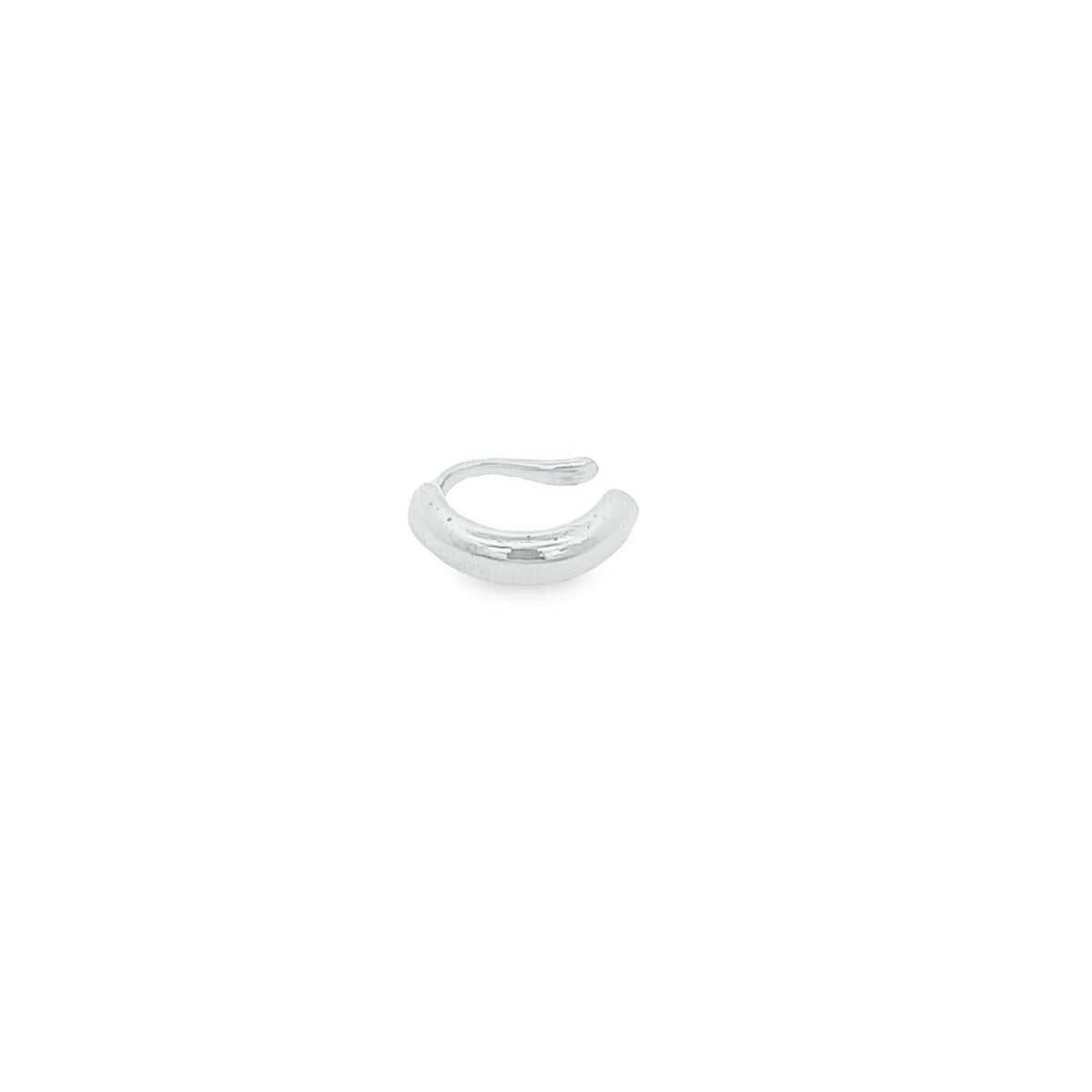 A sleek, silver ear cuff rests against a clean, white background.