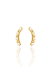 A pair of curved gold earrings adorned with alternating white pearls and gold beads displays a glossy reflection on a white surface.