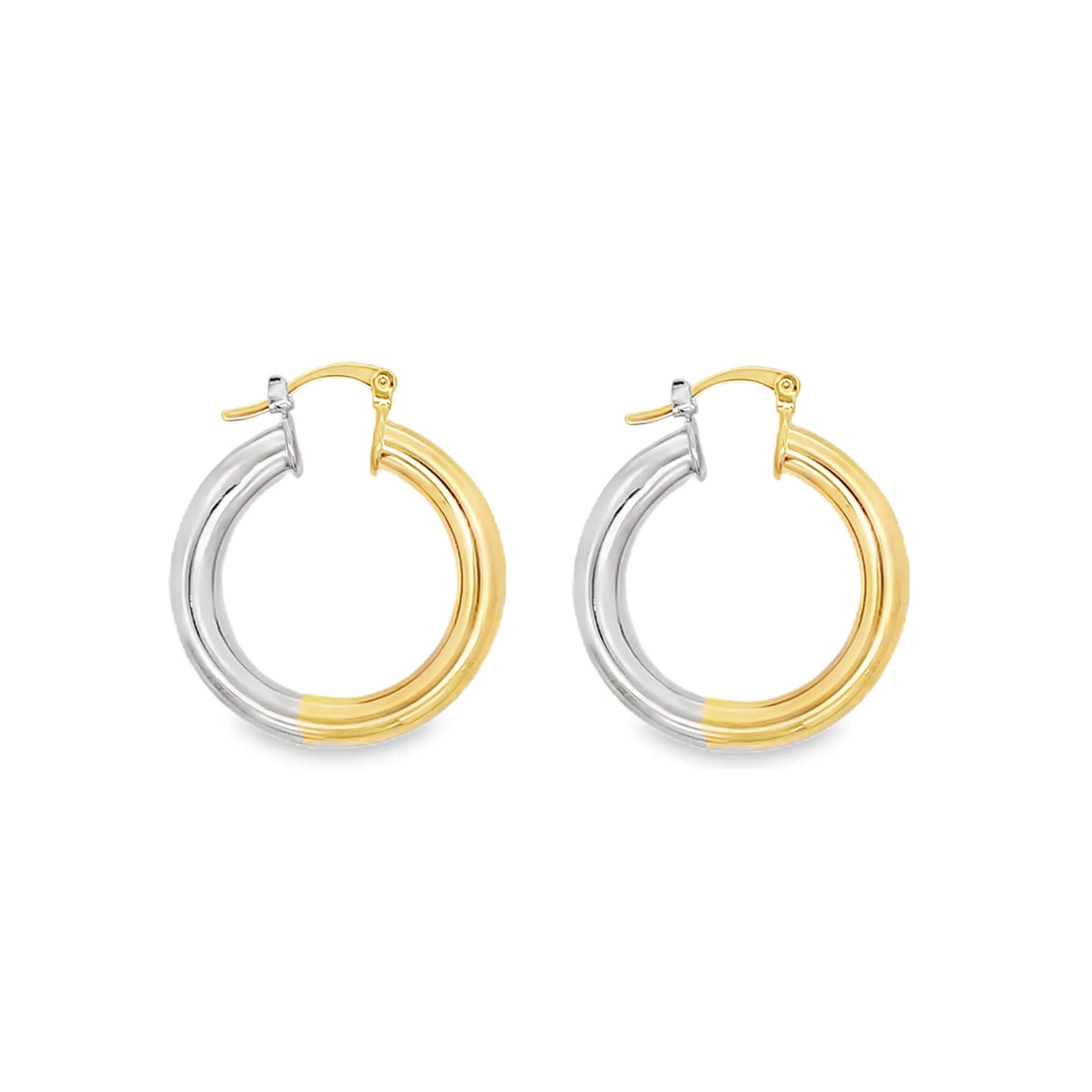 A pair of sleek two-tone hoop earrings showcases a contrasting mix of yellow gold and silver metals against a plain white background.
