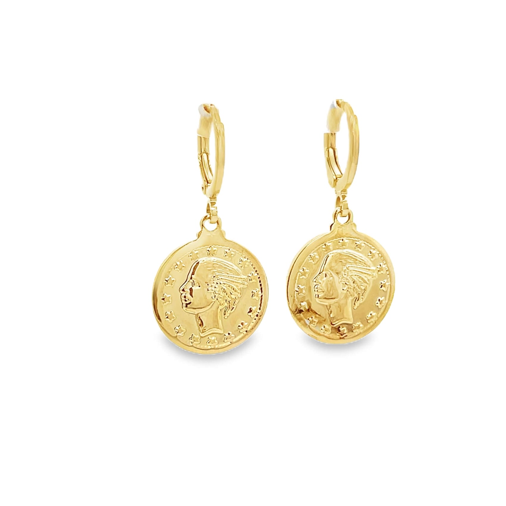A pair of gold coin hoop earrings featuring an embossed profile portrait hang against a clean white background.