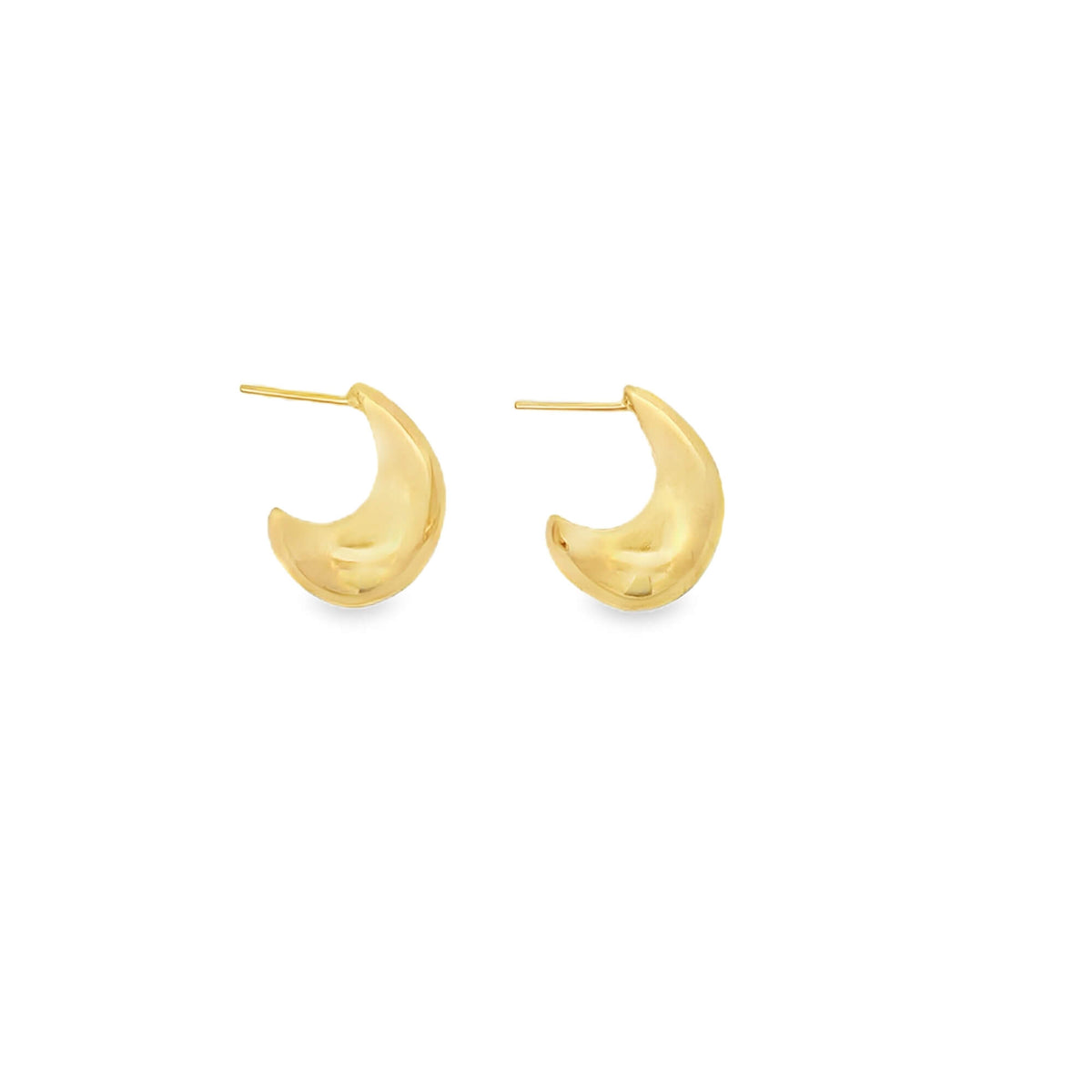 A pair of polished gold crescent moon huggie hoop earrings rests against a clean white background.