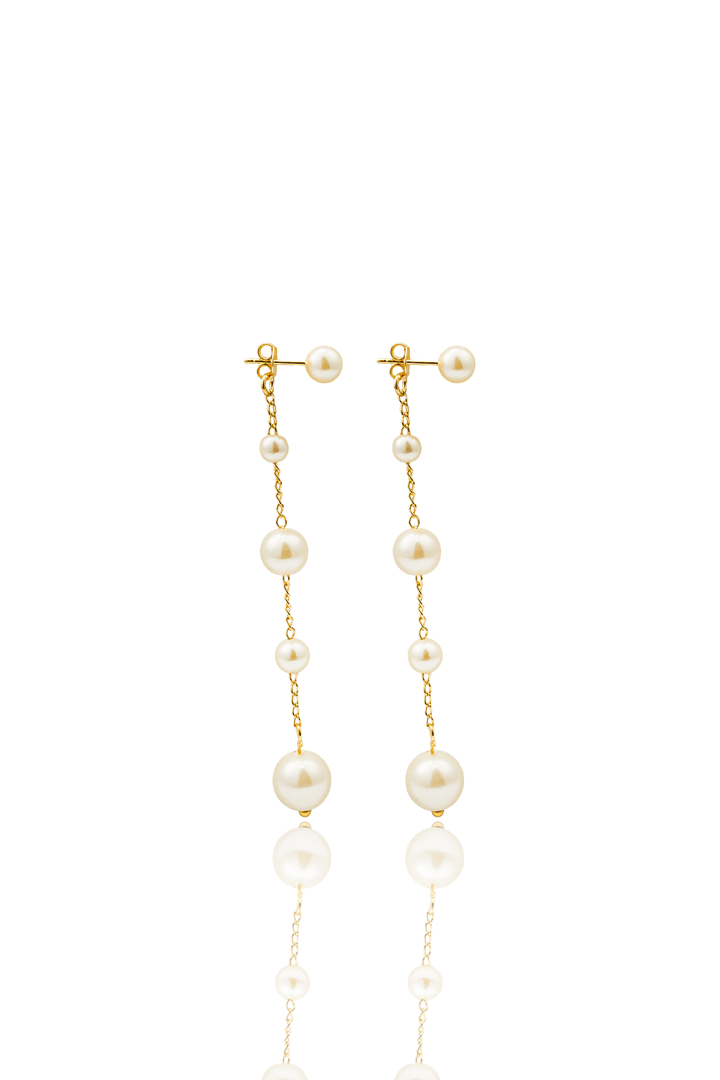 A pair of elegant gold chain drop earrings features alternating pearls of varying sizes against a clean white background.