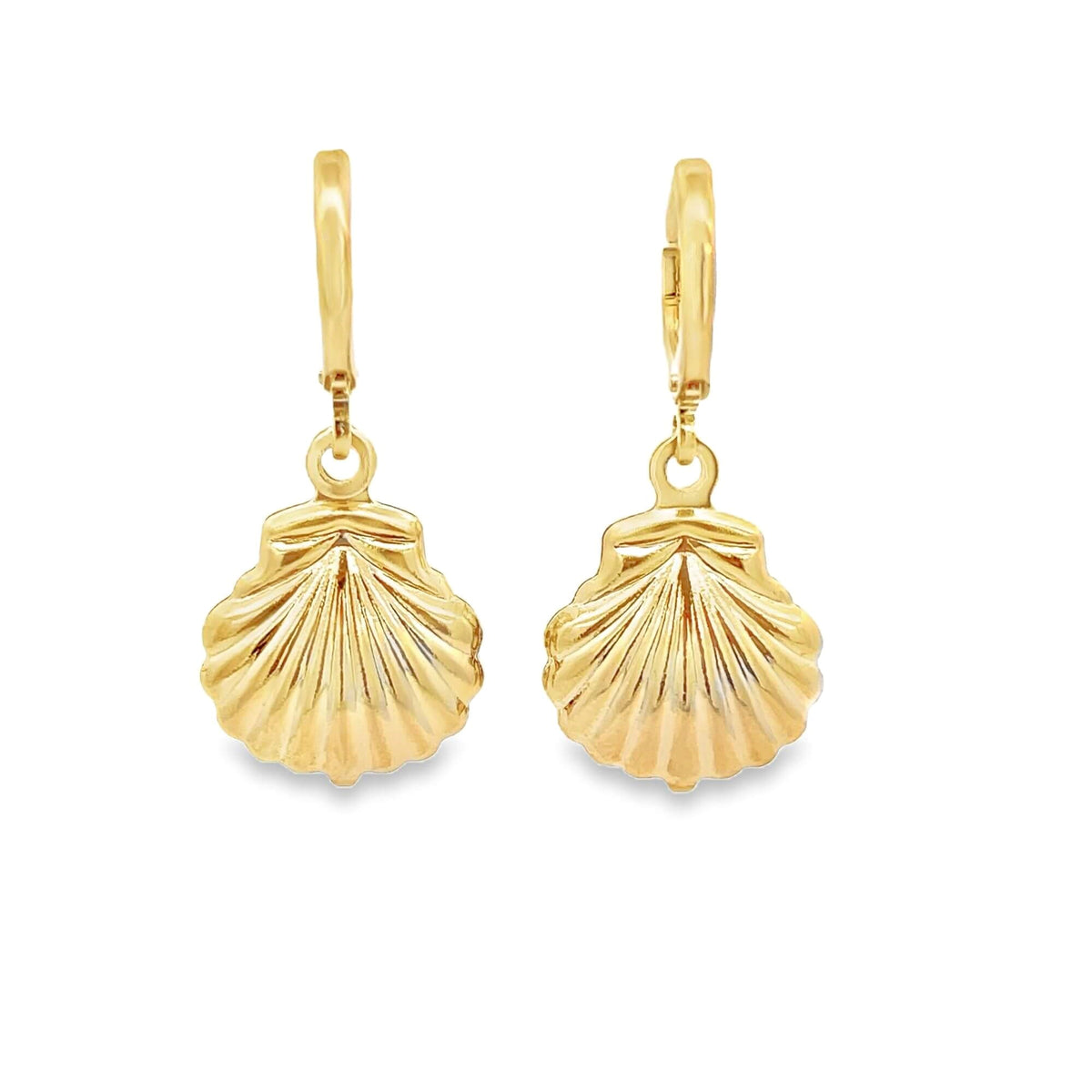 A pair of polished gold seashell charm hoop earrings sparkles against a plain white background.